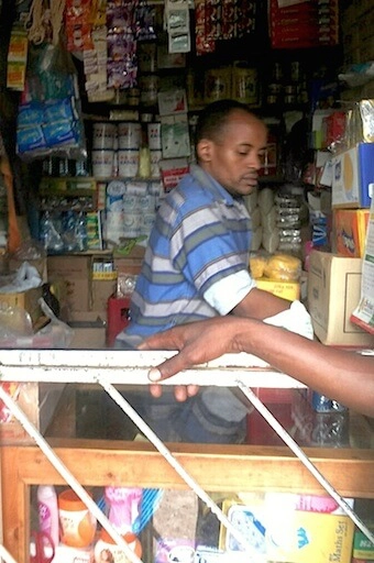 Nairobi M-PESA agent in a shop