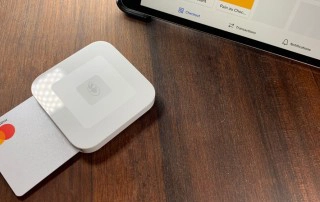 Square Reader on wooden table