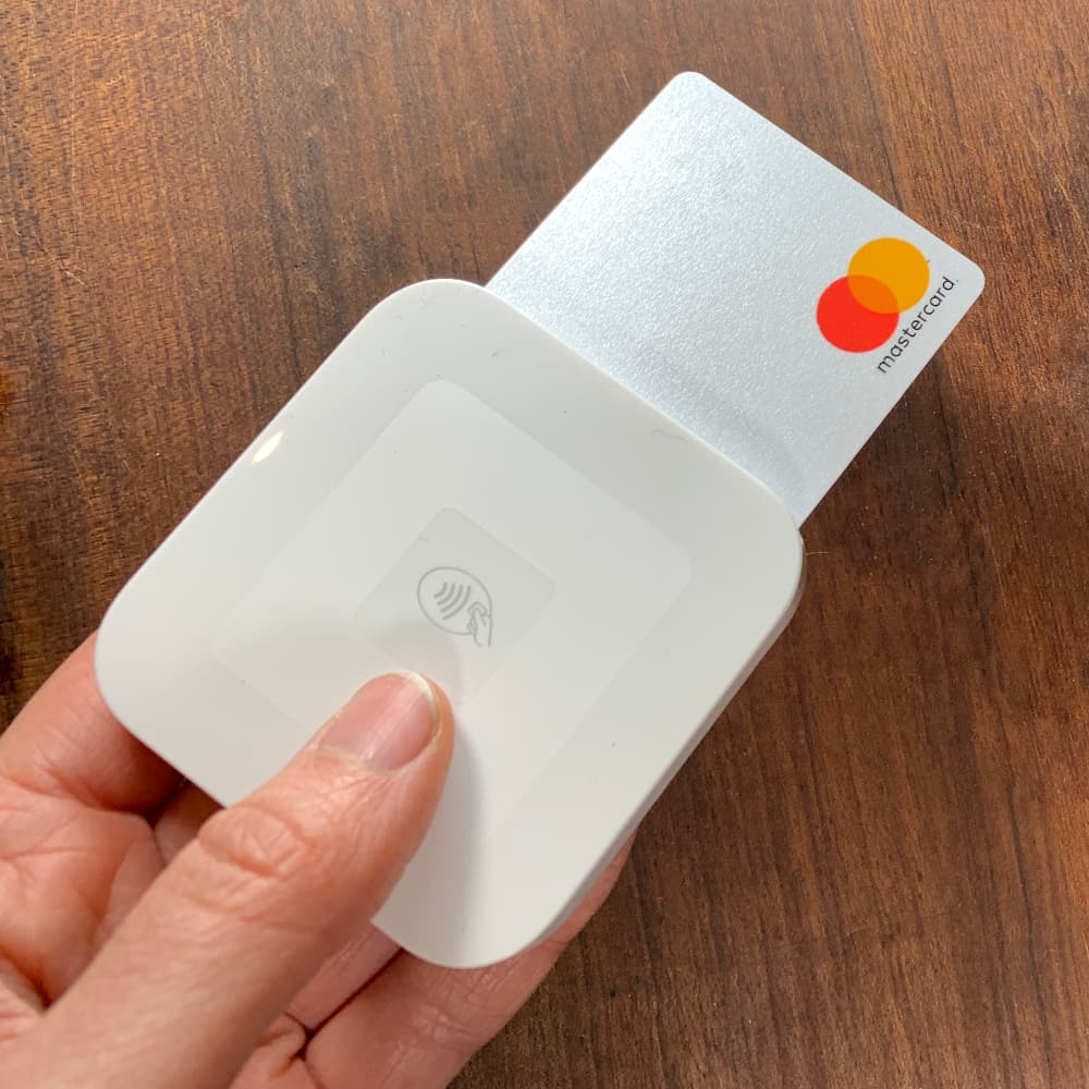 Square Reader with card held in hand