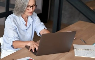 freelance woman working on laptop