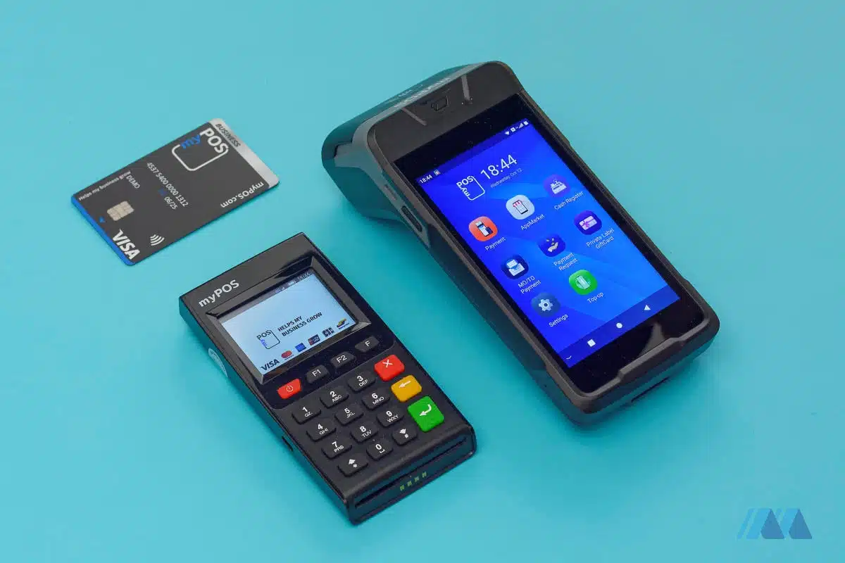 myPOS Go and Carbon terminals next to the myPOS Visa card