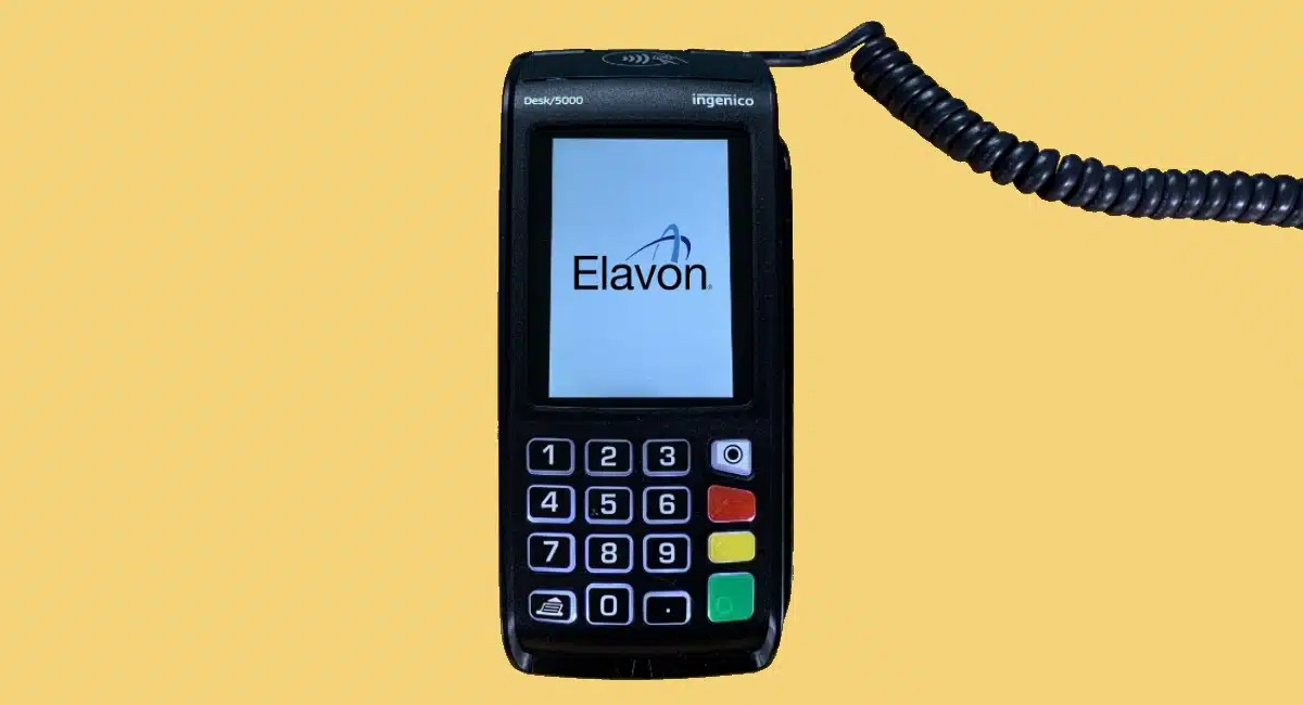 Elavon card machine with Elavon logo on its screen