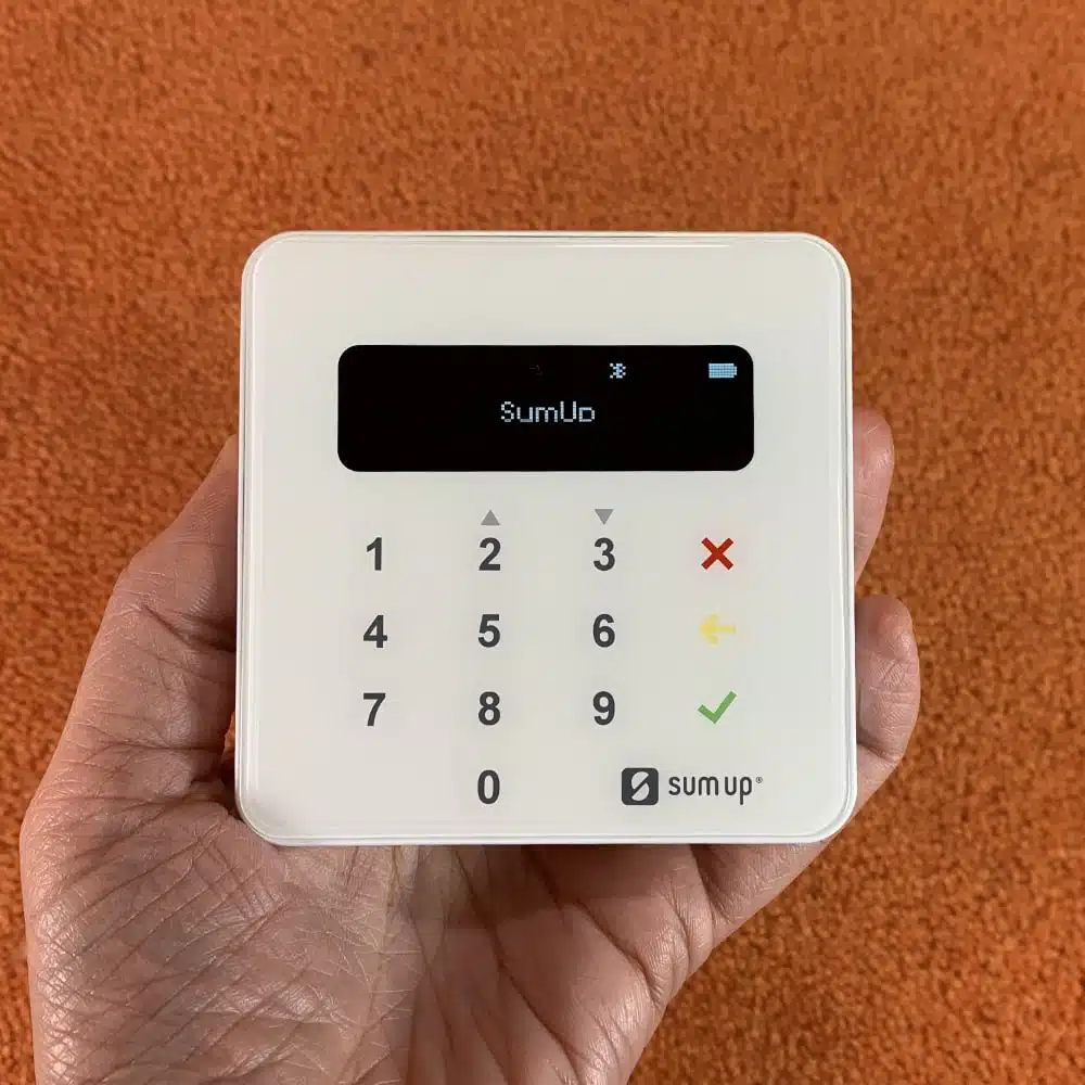 SumUp Air EFTPOS reader in the palm of a hand