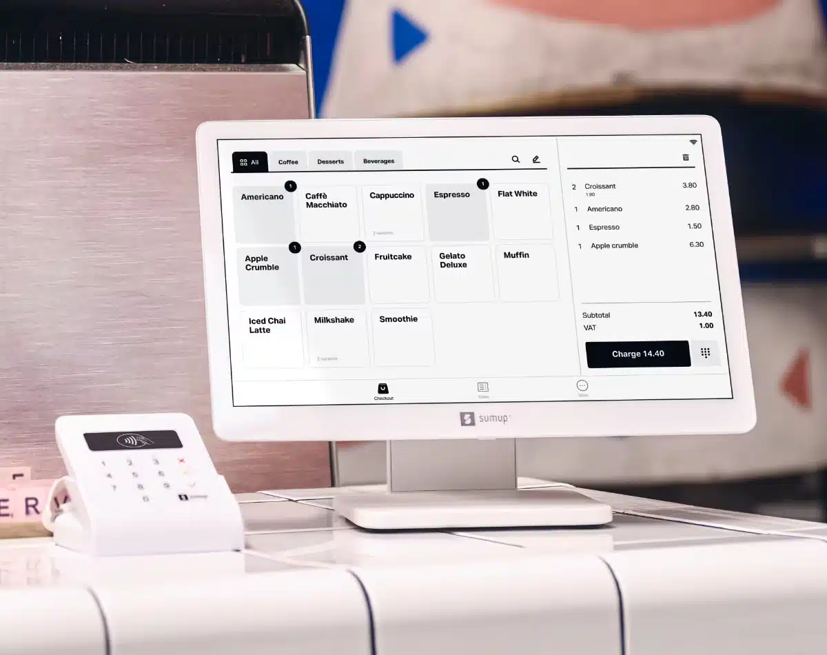 SumUp Point of Sale Lite register with a SumUp Air card reader on a ceramic countertop