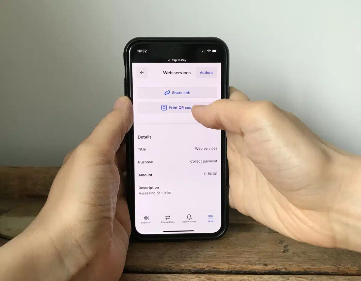 Square Payment Links have QR code options too Square Payment Link options on an iPhone held by our editor