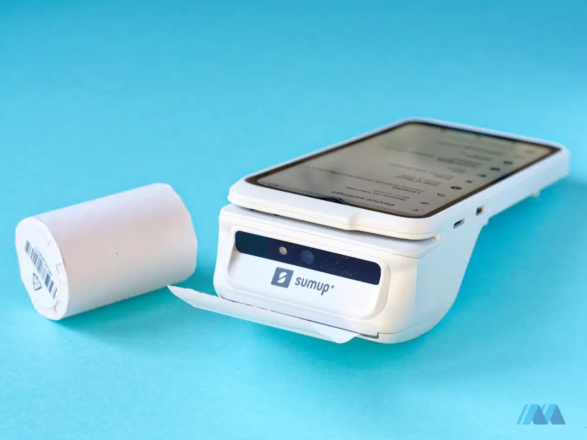 SumUp Terminal prints receipts from the customer-facing top of the terminal SumUp Terminal receipt printer slit and receipt paper roll