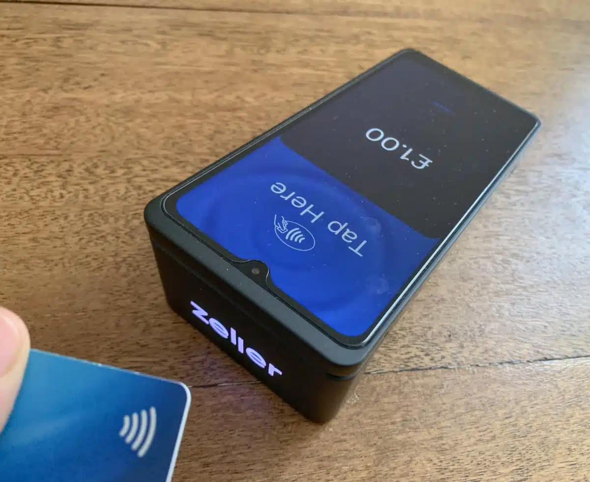 Zeller Terminal 2 looks good from the customer’s end with the lit-up Zeller logo Zeller Terminal 2 accepting a contactless debit card