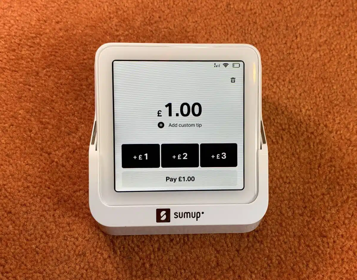 SumUp Solo in its holder The small SumUp Solo card reader works independently and accepts tips