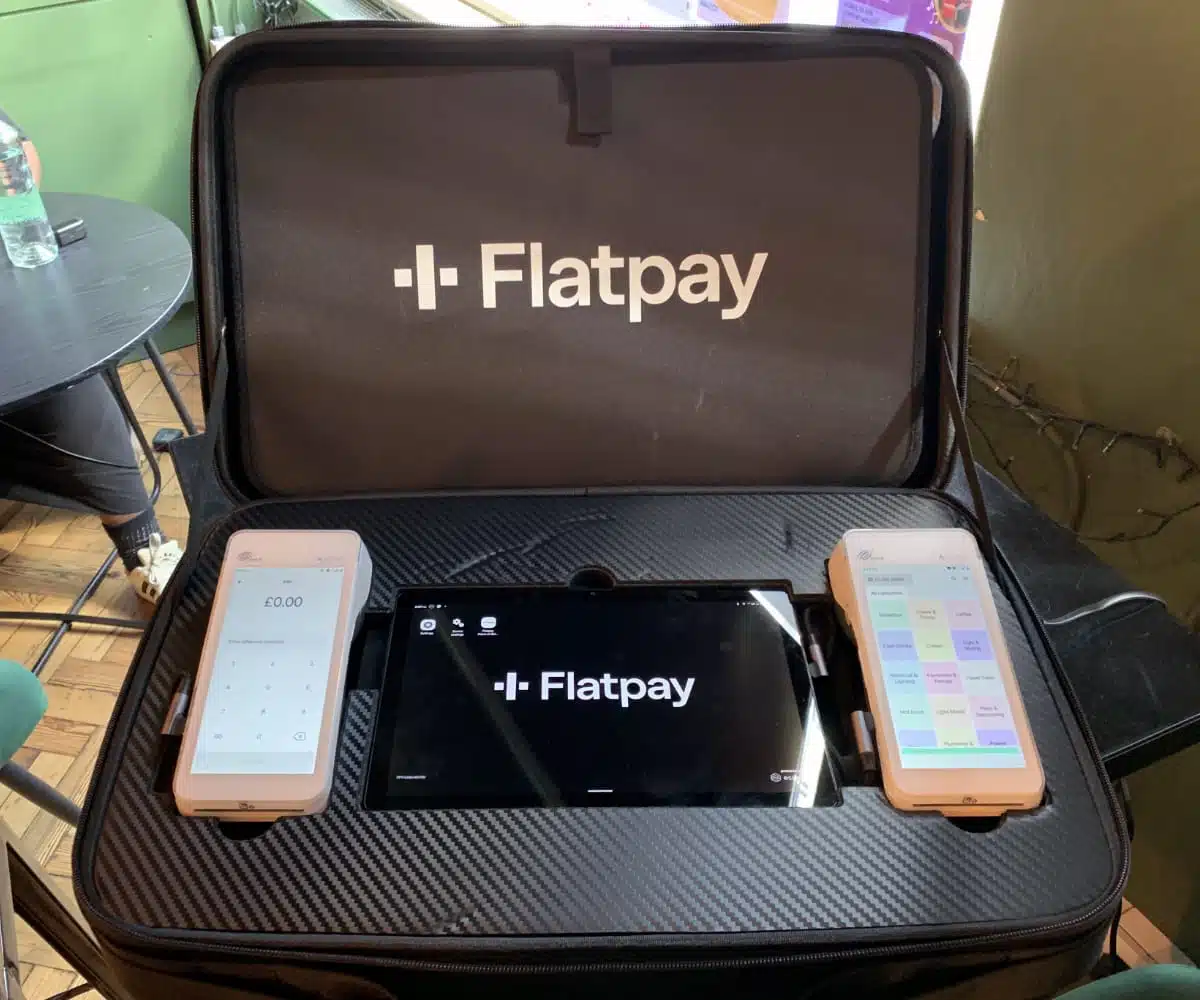 Flatpay arrives with their card terminal products in a suitcase at their first meeting with a merchant Flatopay's presentation suitcase brought by a sales person